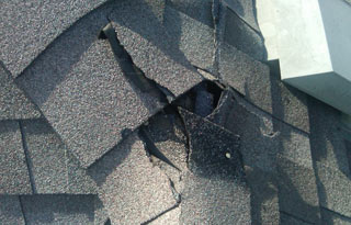 Roof Damaged by Hail Storm